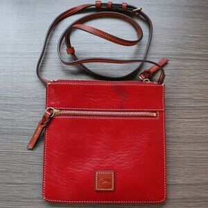 Rich red leather Dooney and Bourke crossbody purse